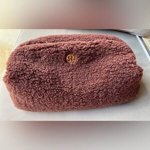 Beautiful Lululemon Beauty or toiletries bag in brown. New never used.